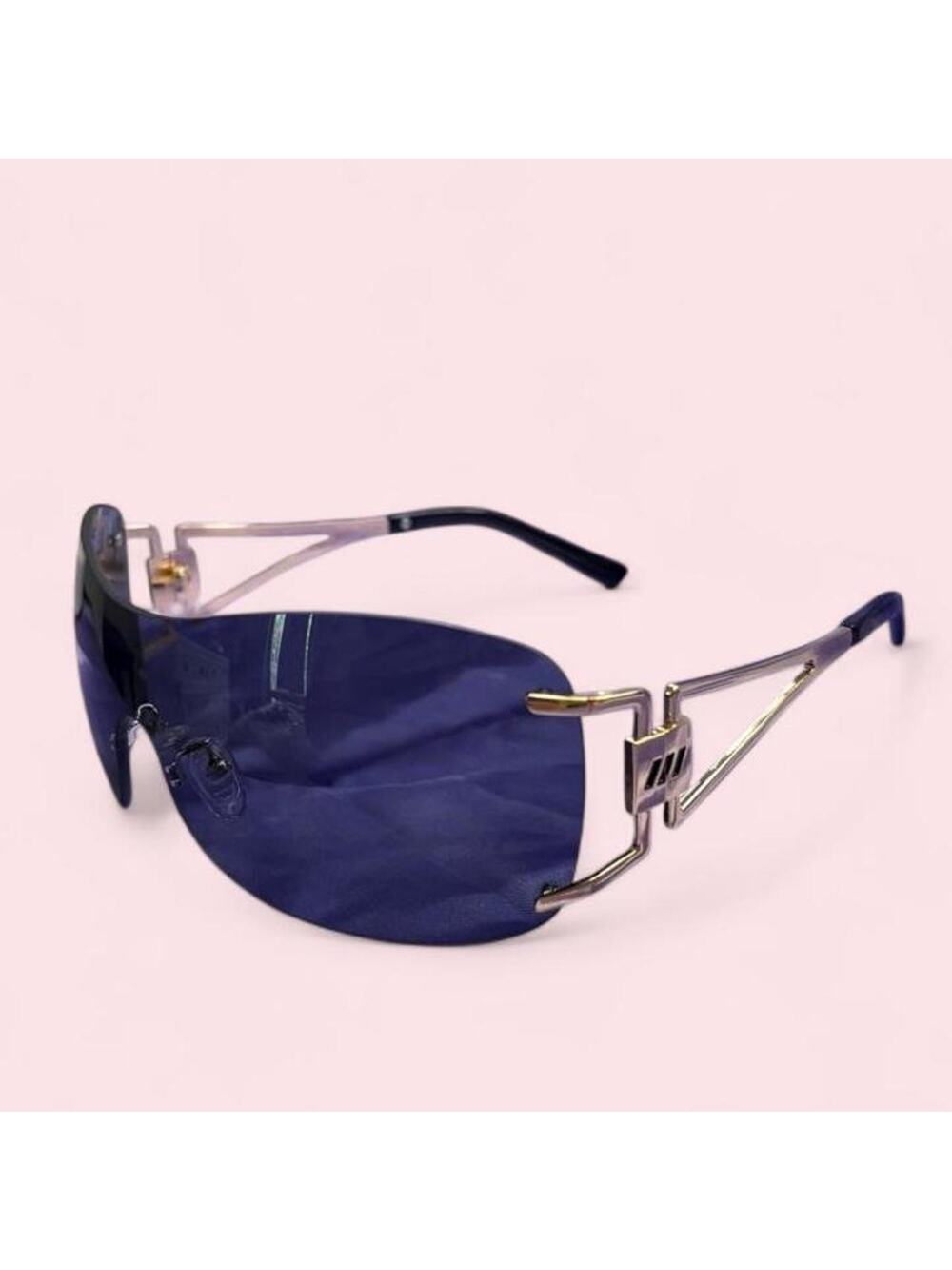 Unisex black futuristic shield sunglasses with tinted lense gold hardware y2k